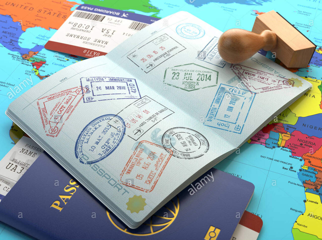 travel-or-turism-concept-opened-passport-with-visa-stamps-with-airline-FTBR7W_副本.jpg